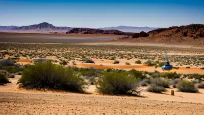 Desert Landscape Vibrant Color Captured in the Bleakness of Sand and Helicopter