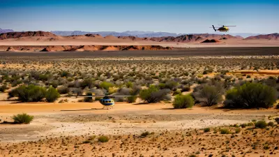 Desert Landscape Vibrant Color Captured in the Bleakness of Sand and Helicopter