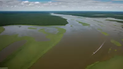Migration in Motion Aerial Shots of Protagonist George Lambert in the Floodplain