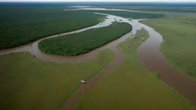 Migration in Motion Aerial Shots of Protagonist George Lambert in the Floodplain