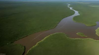 Migration in Motion Aerial Shots of Protagonist George Lambert in the Floodplain